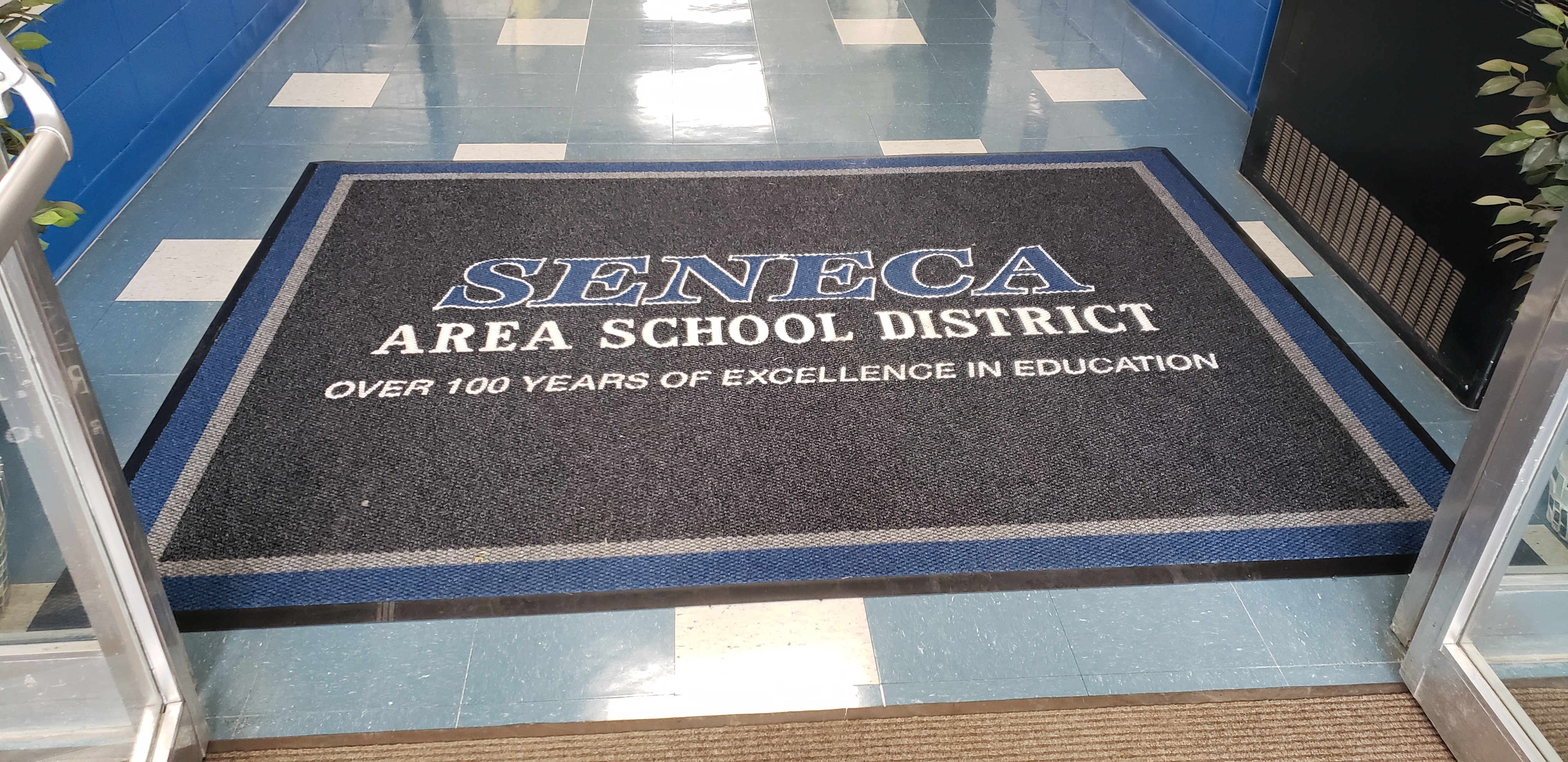 entry rug with School name
